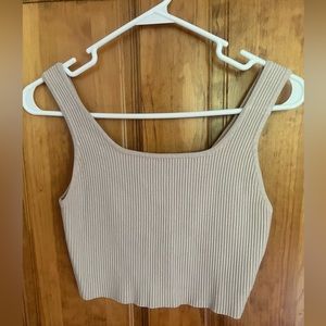 Tan / Sand top in a size small.